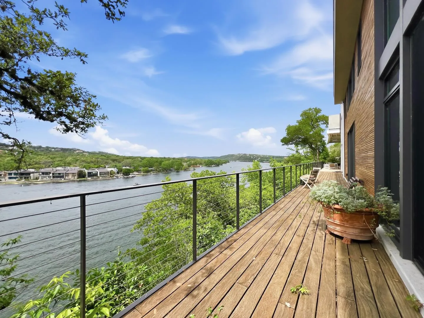 Deck with a wide Lake Austin view